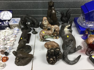 Lot 266 - Group of bronzed resin animal ornaments to include Otters, birds and monkeys