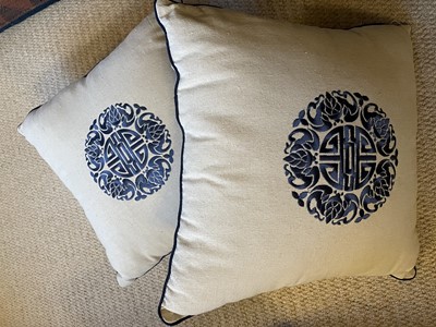 Lot 74 - Two good quality linen and silk embroided cushions with Chinese motif to each centre