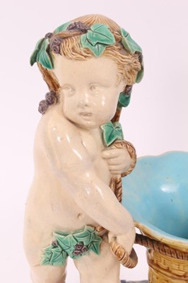 Lot 133 - Victorian Minton majolica glazed figural vase with a bacchanalian putti