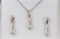 Lot 1590 - White gold (18ct) diamond single stone drop...