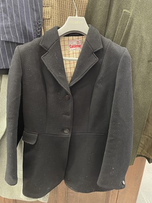 Lot 38 - Collection of vintage and other clothing to include a black hunting coat, leather riding boots, fur coat, various gentlemans suits, ladies green loden coat, vintage wedding dress and other jackets