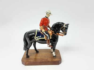 Lot 1106 - Beswick Canadian Mountie on plinth base