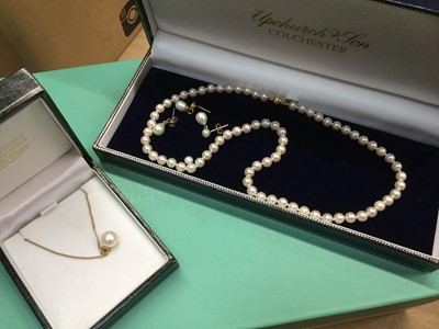 Lot 691 - Cultured pearl 8.9mm and diamond single stone pendant on 18ct yellow gold chain, a cultured pearl single strand necklace 5.9mm on 18ct gold clasp and a pair of cultured pearl earrings