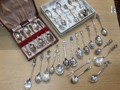 Lot 692 - Set of six six teaspoons in case and various silver and white metal souvenir spoons