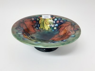 Lot 1111 - Moorcroft pottery bowl decorated in the leaf and Berry pattern