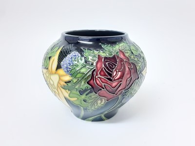 Lot 1114 - Moorcroft pottery vase decorated with flowers and dated 2011