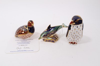 Lot 1131 - Three Royal Crown Derby paperweights including limited edition Partridge with certificate, Baby Bottlenose Dolphin and Rockhopper Penguin