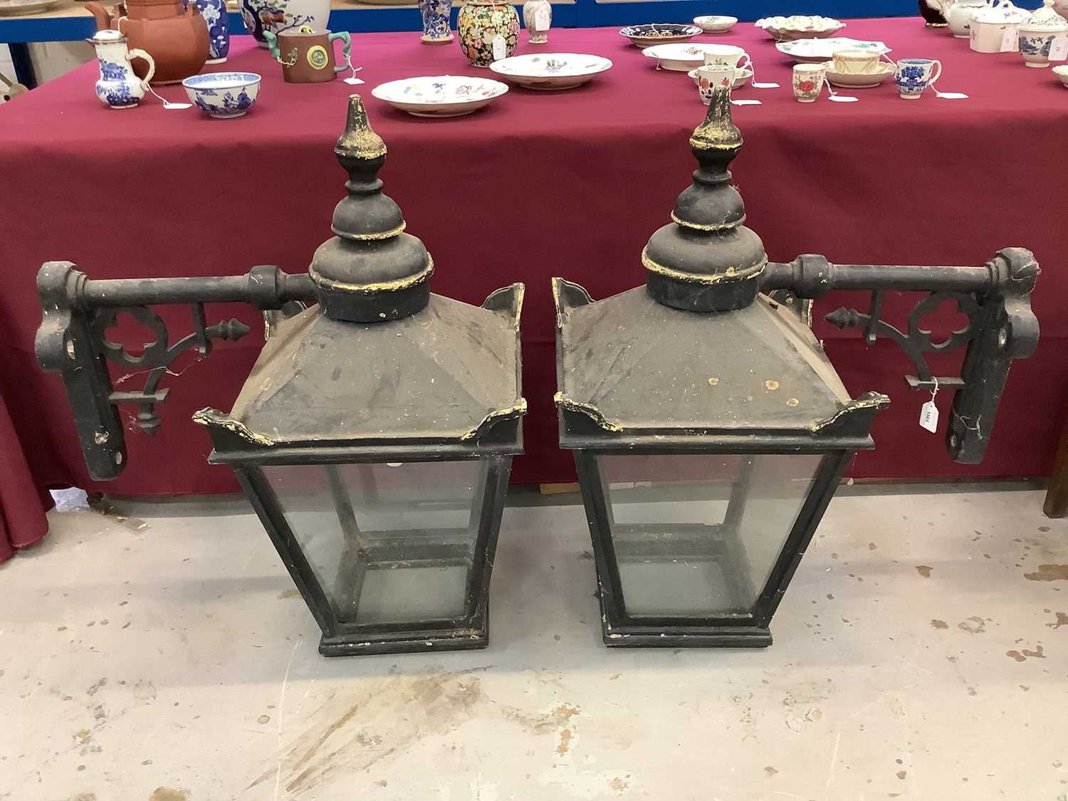 Lot 1565 - Pair of impressive cast metal lanterns