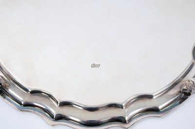 Lot 267 - Contemporary silver salver with piecrust border on scroll feet, Asprey & Co Ltd London 1978