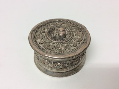 Lot 658 - Indian white metal pot and cover decorated with foliate bands