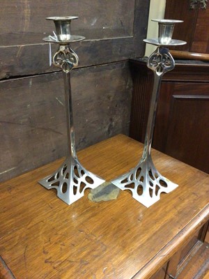 Lot 42 - Pair of Art Nouveau-style plated candlesticks with pierced decorative panels
