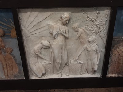 Lot 47 - Early 20th century painted plaster triptych depicting figures, in wooden frame
