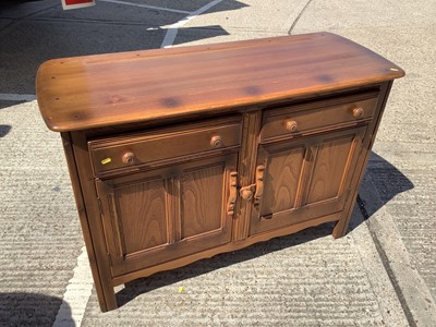 Lot 952 - Ercol sideboard with two drawers and cupboards below, 120cm wide, 48cm deep, 84cm high
