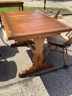 Lot 956 - Ercol draw leaf dining table and set of four chairs