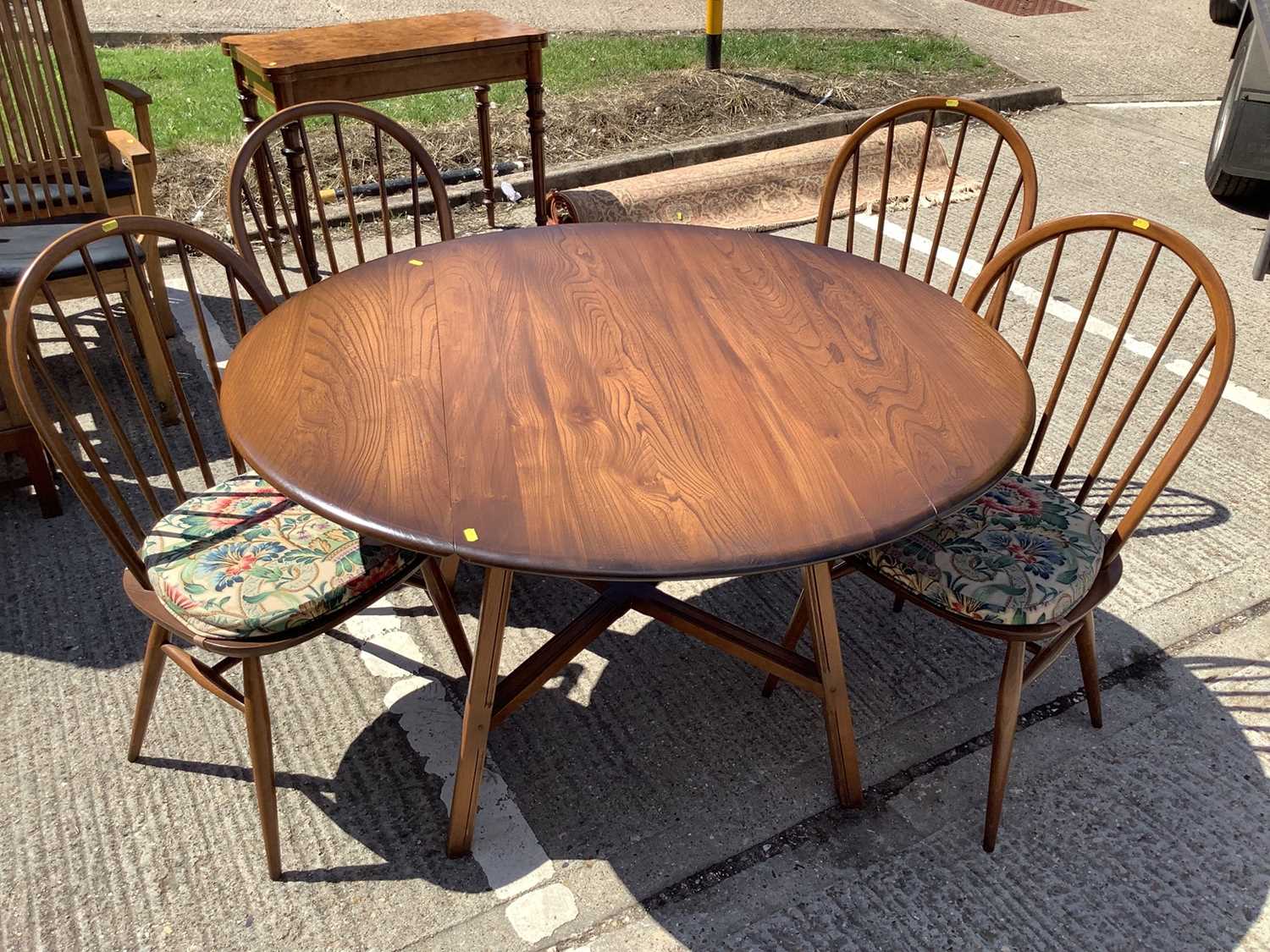 Lot 957 Ercol drop leaf dining table and a set of