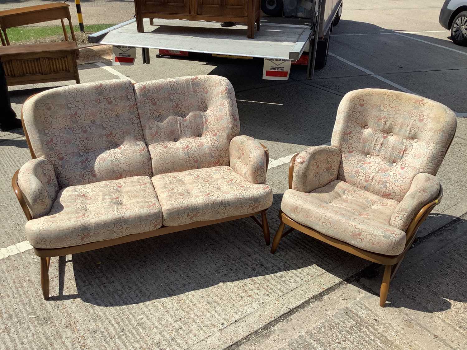 Lot 958 - Ercol two seater settee and a matching armchair