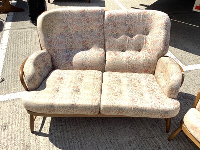 Lot 958 - Ercol two seater settee and a matching armchair