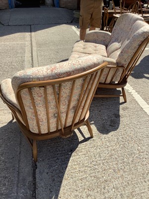 Lot 958 - Ercol two seater settee and a matching armchair