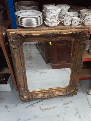 Lot 970 - Bevelled wall mirror in ornate gilt frame, 71cm x 81cm