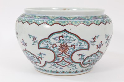 Lot 59 - 20th century Chinese porcelain jardinière decorated in the Doucai style with foliate patterns
