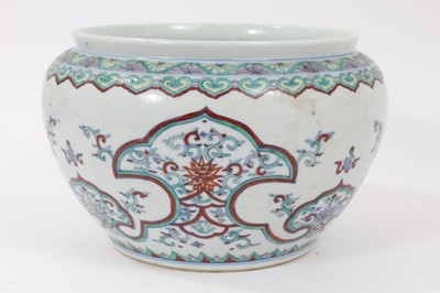 Lot 59 - 20th century Chinese porcelain jardinière decorated in the Doucai style with foliate patterns