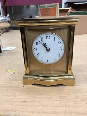 Lot 127 - Early 20th century French brass cased carriage clock with circular white enamel dial, in original leather covered case