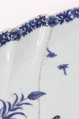 Lot 60 - Two 18th century Chinese blue and white leaf-shaped porcelain dishes, painted with figures