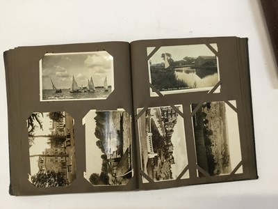 Lot 1418 - Postcards in two albums including real photographic street scenes, Fuller & Son Brewery staff Kelvedon