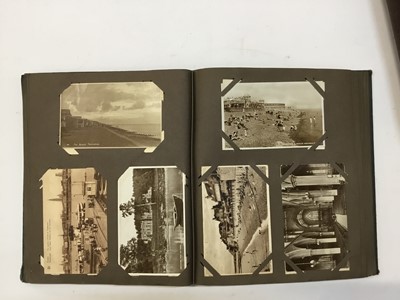 Lot 1418 - Postcards in two albums including real photographic street scenes, Fuller & Son Brewery staff Kelvedon