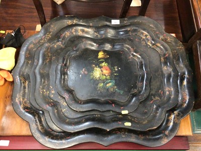 Lot 163 - Set of three graduated early Victorian papier mache trays of shaped form decorated with floral sprays, together with a pair of 19th century steeplechasing engravings and two watercolours