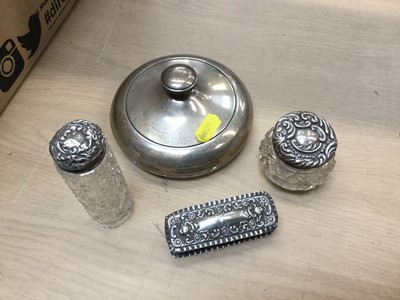 Lot 675 - Silver dressing table box together with three silver and cut glass vanity jars (4)