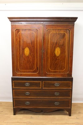 Lot 1415 - Early 19th century inlaid mahogany linen press