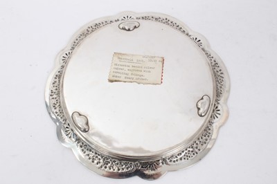 Lot 276 - Victorian silver salver of shaped circular form, with pierced and embossed foliate border