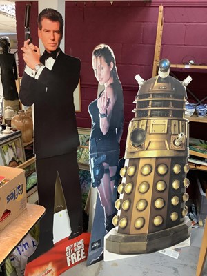 Lot 481 - Three cardboard cinema advertising boards for James Bond, Lara Croft and Dr Who