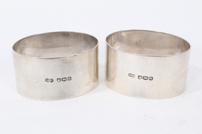 Lot 279 - Two pairs of 20th century silver napkin rings and one other single Victorian silver napkin ring