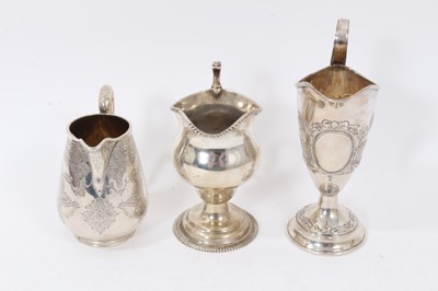 Lot 280 - Victorian silver cream jug of baluster form and two others.