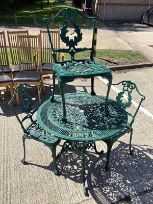 Lot 999 - Green painted aluminium circular garden table and three matching chairs