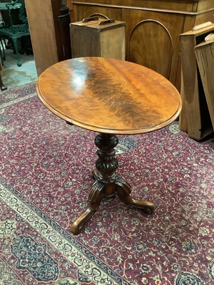 Lot 1001 - Victorian mahogany wine table with oval tilt top on carved and turned column and three splayed legs