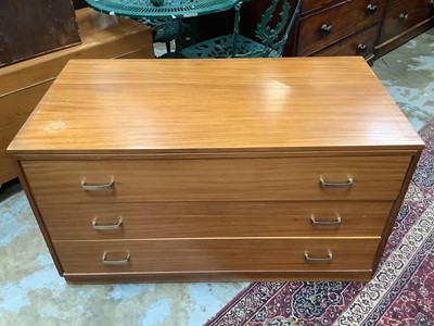Lot 1003 - Pair of mid 20th century teak three drawer chests, 107cm wide, 56cm deep, 61cm high