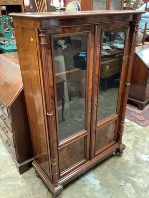 Lot 1004 - Good quality nineteenth century figured and burr walnut bookcase with shelved interior enclosed by two glazed and panelled doors, 99cm wide, 44cm deep, 158.5cm high