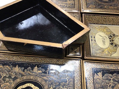 Lot 1938 - Fine early 19th Chinese lacquer games box containing fitted interior with games trays, a good collection of carved mother of pearl gaming counters each with carved crest and motto, ivory counters a...