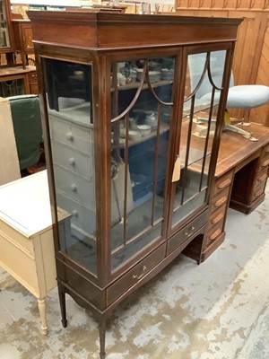 Lot 1020 - Edwardian inlaid mahogany display cabinet with glass shelves enclosed by two glazed doors, with two drawers below on square taper legs with spade feet, 111cm wide, 38cm deep, 171cm high