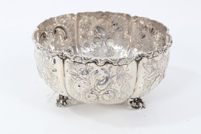Lot 1967 - Victorian silver sugar bowl with embossed foliate panels, on scroll feet