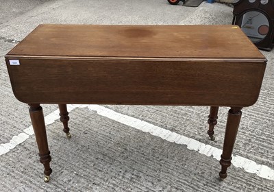 Lot 1031 - Mahogany drop leaf table with end drawer on turned legs