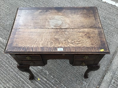 Lot 1035 - Antique oak lowboy with three drawers on cabriole legs withclawandballfeet, 75cm wide, 49cm deep, 69cm high