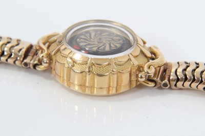 Lot 1996 - 1950s/1960s ladies Ernest Borel gold cocktail wristwatch with ‘mystery’ dial in 18ct gold case on 9ct yellow gold snake link bracelet, length 18cm.