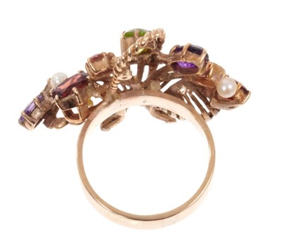 Lot 1979 - Gold and gem-set ‘Gardenia’ ring with a stylised basket of flowers, on a plain gold shank. Finger size approximately N.