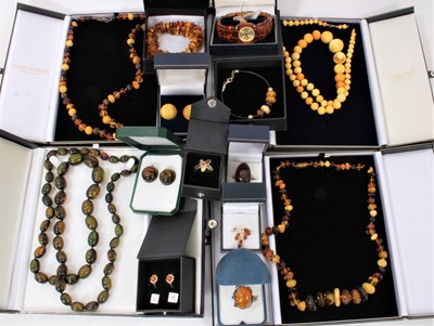 Lot 1992 - Group of amber jewellery to include dress rings, necklaces etc