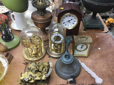 Lot 306 - London Clock Company Quatz mantel clock, together with two anniversary clocks, carriage clock, oil lamp and bell
