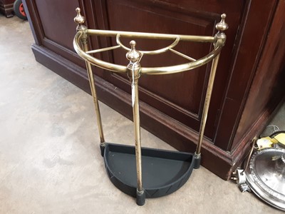 Lot 1047 - Victorian style brass stick stand and a brass firescreen with bevelled plate (2)